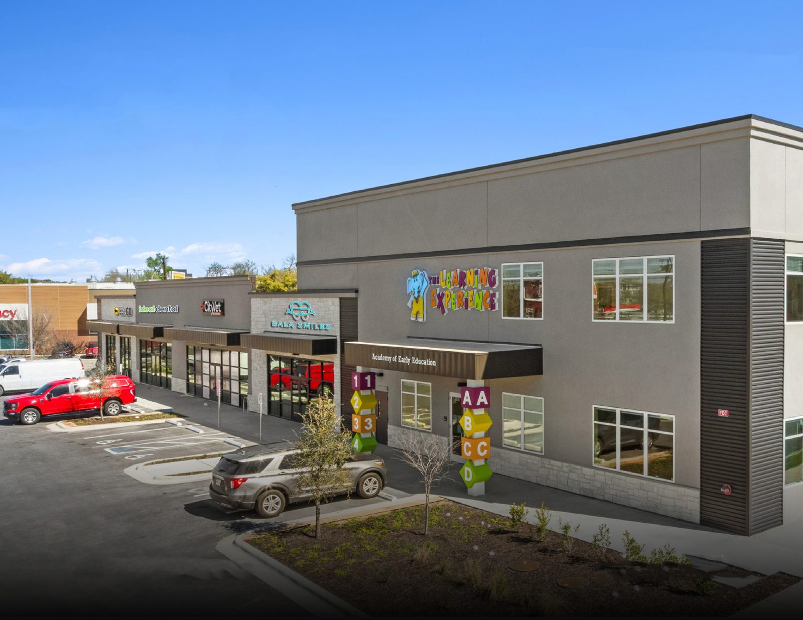 Multi-tenant small-bay retail center with necessity-based, daily-needs tenants